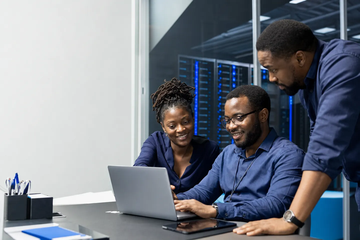 Technology professionals collaborating in a modern IT environment